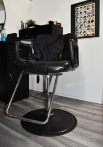 A barber chair in a barbershop