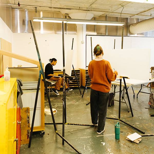 Adm_HowtoApply_Essay A student paints in a MIAD classroom