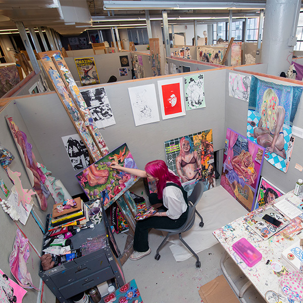 A student works in a fine art studio.