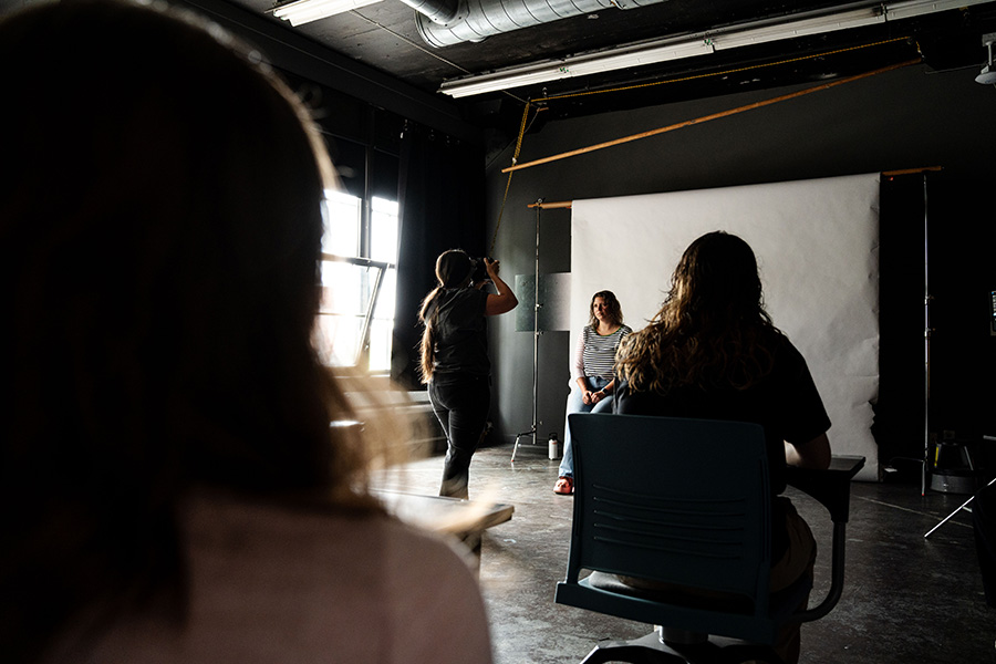 A group of students uses the MIAD lighting studio
