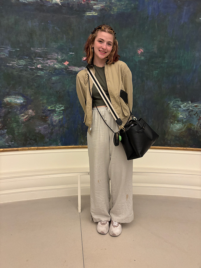 Madison Boeder in front of a Monet painting.