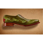 A rendering of a side view of a men's dress shoe in green with light green detailing along the side.