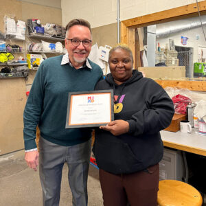 Arma Zeqiri and Jeff Morin with the September 2025 MIAD Values Recognition Award