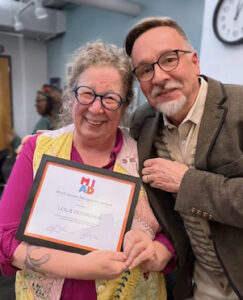 Leslie Fedorchuk and Jeff Morin pose together with Leslie's Values Recognition Award