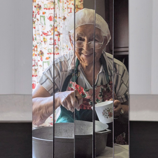 A pink-hued collage of textures and varied pictures.