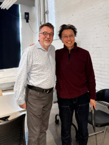 Jeff Morin and Jason Yi pose together during the awarding of the Values Recognition Award