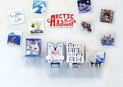 Wall display featuring illustrations of arctic animals for a 24-day arctic wildlife advent calendar