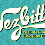 Nezittar Mexican Brewpub logo displayed in large white script lettering on a turquoise patterned background, with “Mexican Brewpub” in yellow text below.
